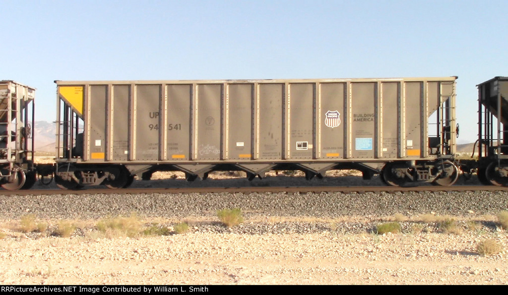 WB Unit Loaded Hooper Frt at Erie NV W-MdTrnSlv-Pshrs -76